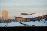Вид из окна арены. Жилые здания и футбольный центр.